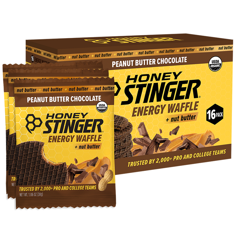 Honey Stinger Peanut Butter Chocolate Energy Waffle packaging with a box of 16 waffles.