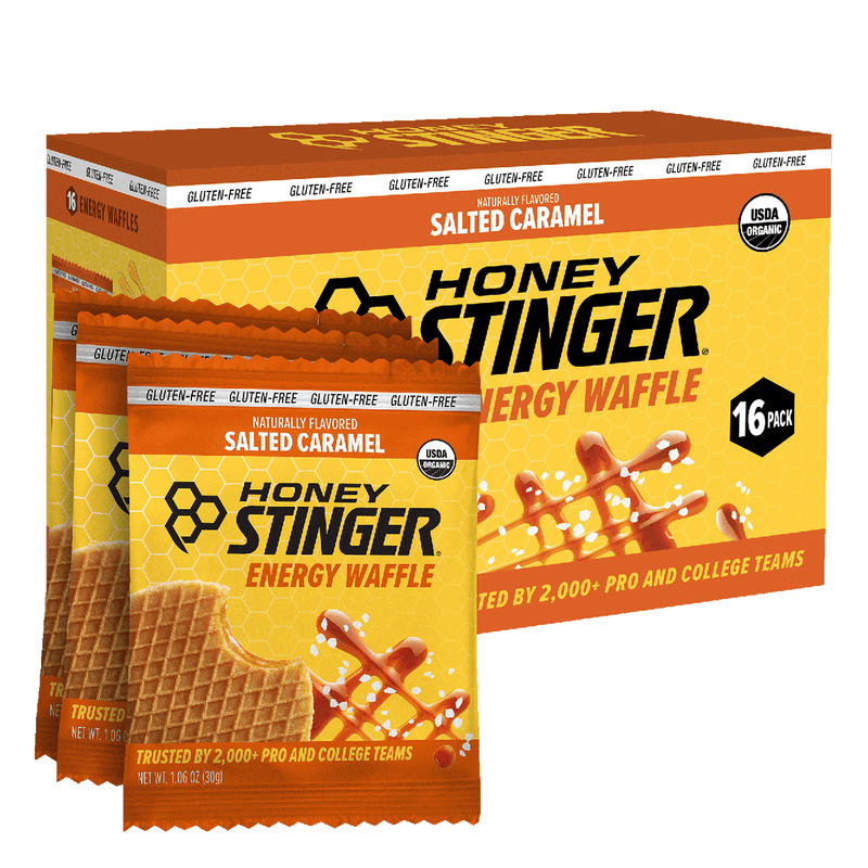 Honey Stinger Salted Caramel Energy Waffle packaging with a box of 16 packs.