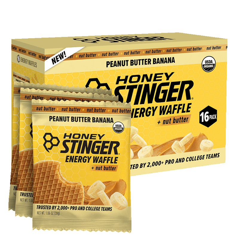 Honey Stinger Peanut Butter Banana Energy Waffle packaging with a box of 16 packs.