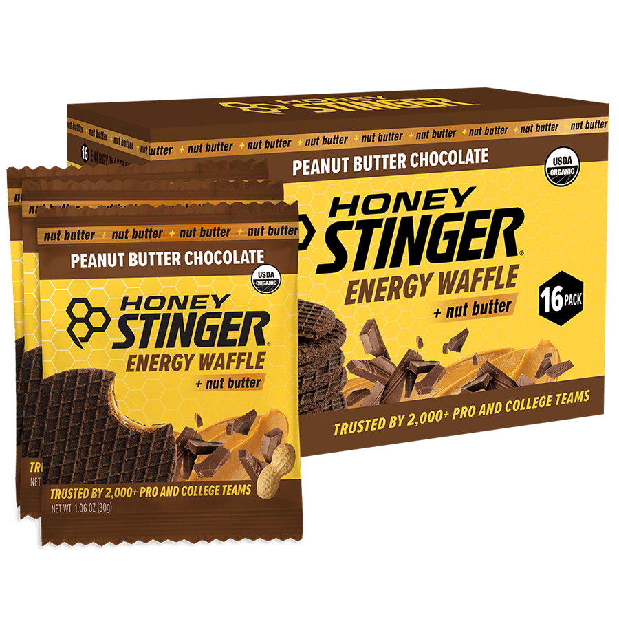 Honey Stinger Peanut Butter Chocolate Energy Waffle packaging with a box of 16 waffles.