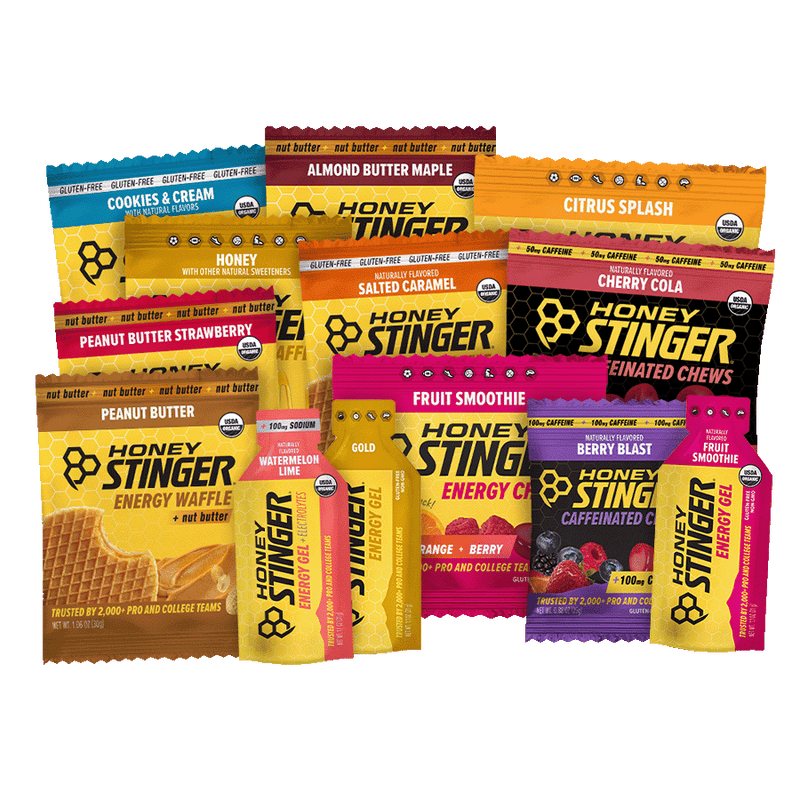 Assorted Honey Stinger energy products on a white background